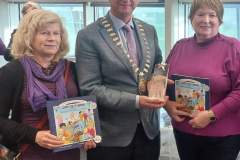 Leixlip Disability Access Group (LDAG) worked with CKAN to produce “The Mystery of the Missing Puppies”.  Book Launch 2023 with Mayor of Kildare 