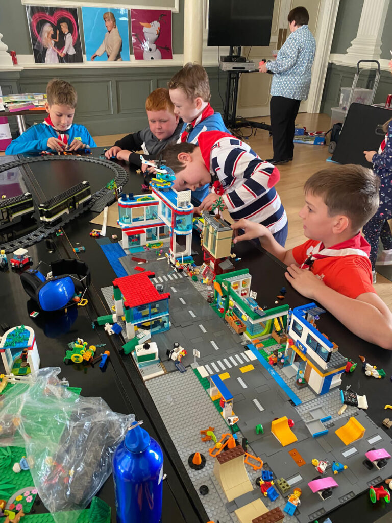 A group of children playing with toys .