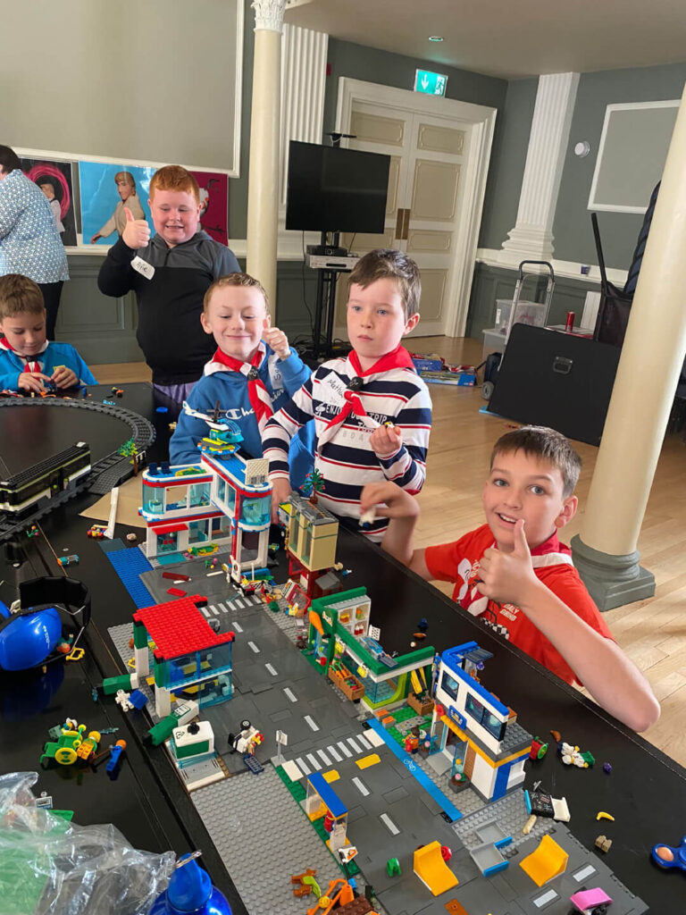 Kids Playing With Lego Set